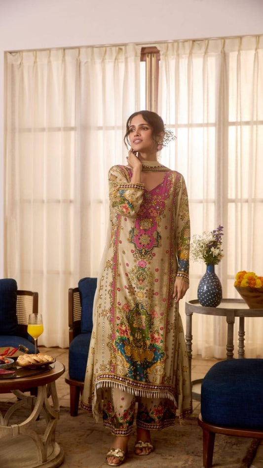 Woman in a traditional outfit standing in a room with curtains and furniture.